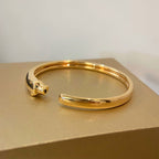 ??MIRA?¡¥PANTHERE GOLD OPEN BRACELET