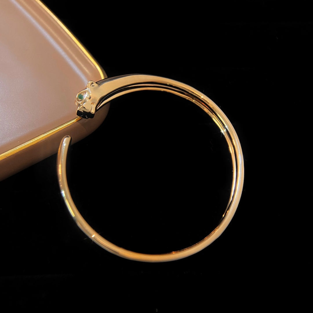 ??MIRA?¡¥PANTHERE GOLD OPEN BRACELET