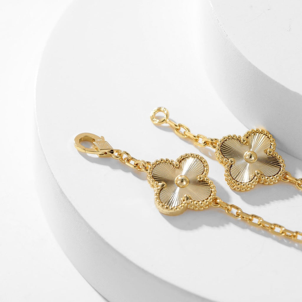 ??MIRA?¡¥CLOVER 10 MOTIFS LASER NECKLACE