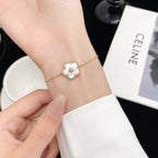 ??MIRA?¡¥LUCKY WHITE MOP PLUM BLOSSOM  BRACELET