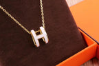 ??MIRA?¡¥HM CLIC YELLOW ENAMEL GOLD NECKLACE
